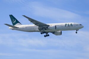 A Pakistan international Airlines (PIA) plane Source: Pexels https://www.pexels.com/photo/photo-of-an-airplane-under-a-blue-sky-11257740/